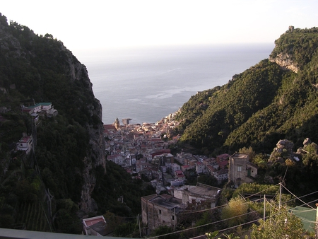 Living between the Mountains - vegetation, village, between, mountains, sky