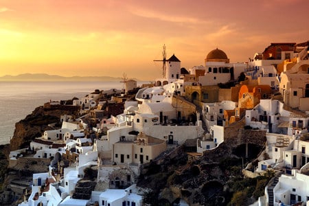 On a Ionian Island - mill, sea, orange, houses, rocks, sky