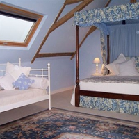 Attic Bedroom with Antique Canopy Bed