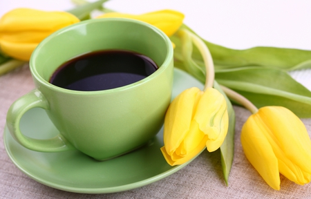 Coffee - pretty, yellow, coffee, beautiful, photography, beauty, yellow tulips, lovely, still life, tulip, flowers, tulips, nature, green, cup of coffee, cup