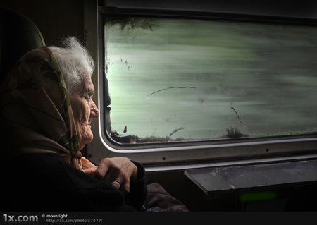 Gone with her dreams - train, window, sad, old lady