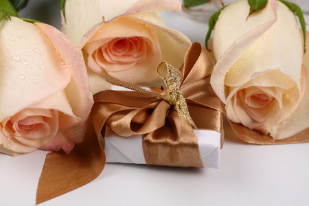 roses - nice, roses, gift, photography, bouquet, elegant, rose, cool, box, romance, holiday, harmony, drops, wet, beautiful, flowers, photo, flower