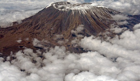 Kilimanjaro wrapped in clouds, Kenya, Africa - clouds, africa, snow, kilimanjaro, mountain