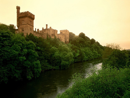 Lismore Castle Ireland - building, trees, irish, structure, foliage, luxury, home, woods, river, turrets, green, holiday, accommodation