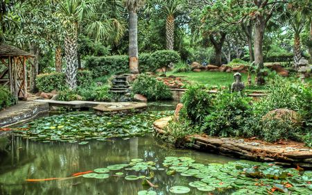 Tranquillity - trees, peaceful, water, cascade, wood, water lilies, orange, green, rock, pond, shrubs, stone, tree ferns, statue, pergola, koi carp, gardens, plants, serenity, lilly pads, leaves, meditation, pool