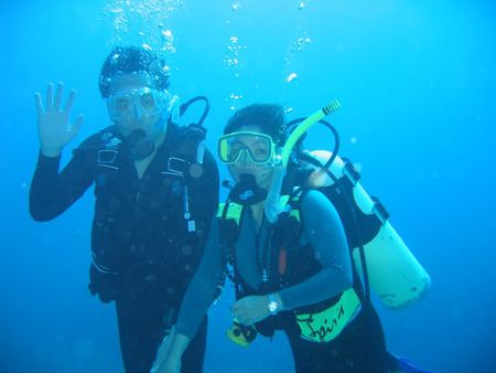 Scuba Diving couple - woman, water, man, diving