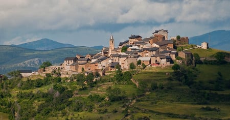 Village on Mountain - vegetation, village, clouds, tower, walls, mountains, houses