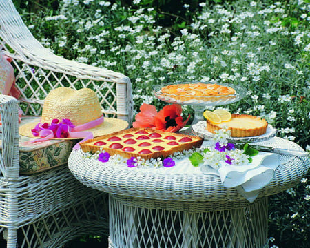 Garden  delights - hat, wicker, napkin, food, table, chair, flowers, garden, lemon