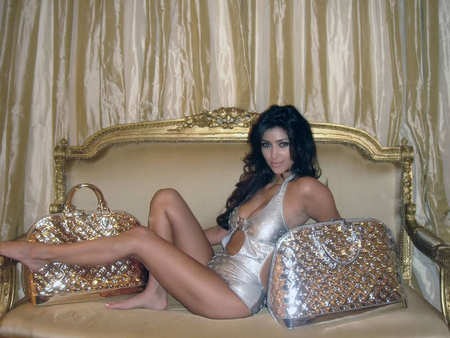 Kim Kardashian - bed, female, yellow ochre, silver, pillow, gold, models, brunette