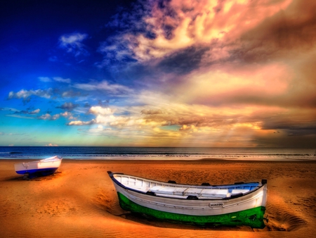 Boats - lit, lonely, sunny, summer, sand, light, nice, sunlight, beauty, colors, boats, nature, seascape, coast, blue, shoreline, beach, boat, evening, shore, red, view, sky, sun, clouds, water, beautiful, sea, lovely, ocean, colorful, rays, sands, peaceful