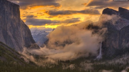 mountains mist - clouds, pine forest, beautiful, rock, morning, waterfall, mist, mountains, orange sky