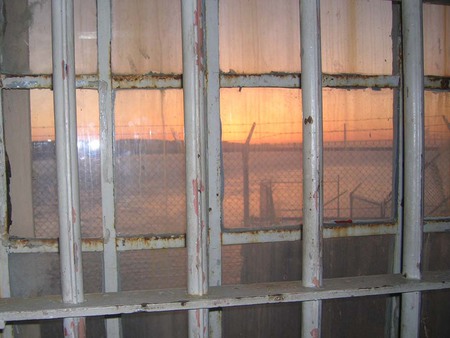 Sunset through bars at Alcatraz - entertainment, iron, brick, view