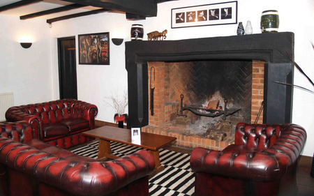 Fireplace - sitting places, small table, living corner, black red foteille, hotel room, big fireplace, beautiful, fire