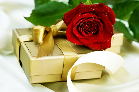 With Love - beauty, roses, gift, photography, rose, still life, with love, package, pretty, valentines day, romance, ribbon, golden, drops, love, lovely, nature, romantic, bow, red, beautiful, flowers, colors, red rose