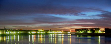 Arles, France - sky, water, reflection, clouds, light, at night