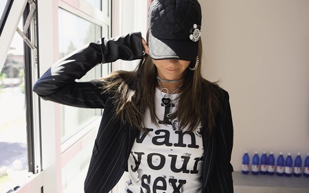 It pays to Advertise - t-shirt, hat, glass, people, female, girl, slogan, jacket, chains, earrings, window, cute