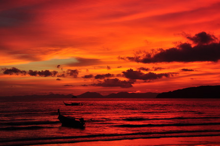 Red Sunset - beauty, sky, peaceful, sunset, amazing, view, clouds, orange, red sunset, boat, ocean, boats, sailing, lovely, waves, nature, beautiful, red, colors, sea