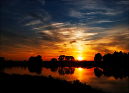 Sunset - beautiful, amazing, grass, view, river, nature, sunset, colorful, water, beauty, peaceful, lake, sky, reflection, clouds, lovely, trees, colors