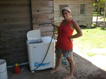 washing machine - dirt, woman, hose, water