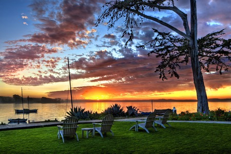 Lovely View - beauty, sky, trees, sailboats, peaceful, sun, colorful, sunset, chairs, other, view, clouds, green, grass, boat, ocean, laky, boats, park, summer, sailing, lovely, nature, chair, beautiful, splendor, colors, sailboat, flowers, sea