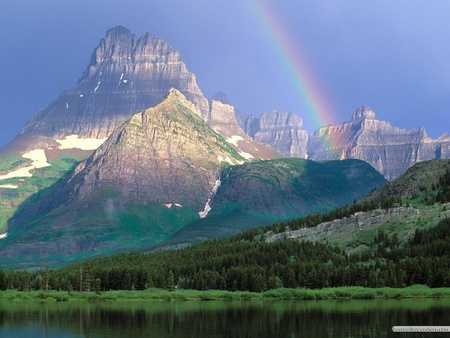 Rainbow Over The Mountain - rainbow, lake, forest, light, mountain, sun, sky