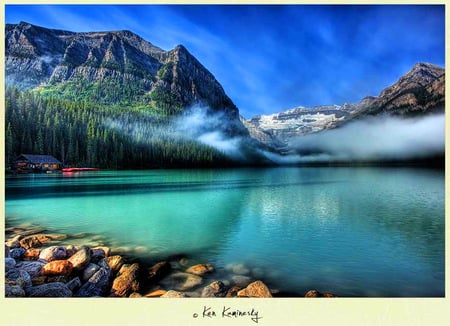 Out of the clear blue - reflections, trees, shore, mist, blue sky, mountains, cottage, clear water