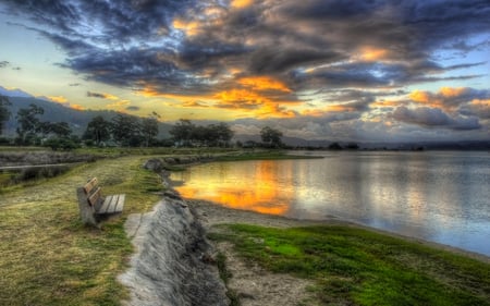 Beautiful Place - grass, forest, reflection, sand, view, bench, lake, houses, sky, clouds, house, trees, water, beautiful, rock, beauty, colors, lovely, architecture, ground, colorful, nature, sunset, green, mountains, peaceful