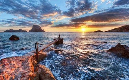 Sunset - ocean waves, sundown, sun, paradise, colorful, sunset, seagull, view, amazing, evening, reflection, light, ibiza, waves, glow, nature, pier, beautiful, sunrise, sea, beauty, sky, hammock, peaceful, water, rocks, clouds, spain, rays, ocean, sunlight, shore, summer, lovely, splendor, colors, britney spears