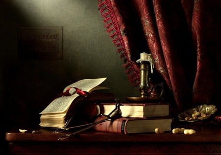 Regal - ribbon, candle, red draperies, table, books