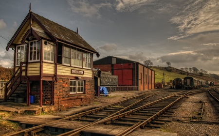 Train Station - beauty, autumn, sky, trees, peaceful, colorful, tracks, train, fall, view, clouds, architecture, green, house, grass, hill, railway, houses, station, landscape, hills, lovely, nature, train station, beautiful, trains, colors