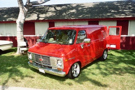 A CHEVY VAN - outside, chevy, custom, red, van, classic, grass, show