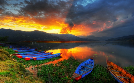 Sunset - scenery, blue, amazing, boat, splendor, landscape, grass, reflection, view, hdr, lake, sky, sun, clouds, trees, water, beautiful, set, beauty, colors, lovely, boats, colorful, nature, sunset, green, mountains, peaceful, bold