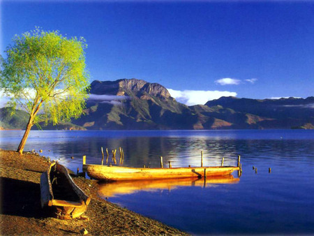 Amazing view - vivid, reflectiv, mountain, riverbank, water, cloud, canoe, tree, boat