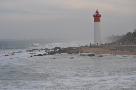 The Wind Blows - storm, wind, lighthouse, beach, sea