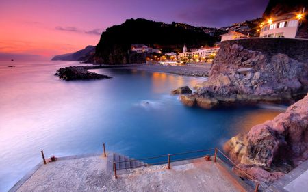 Ponta do Sol at Sunset - tourism, mountains, pebbles, lights, rocks, evening, madeira, village, beach, palms, ocean, hotel, tourist, sunset, sea