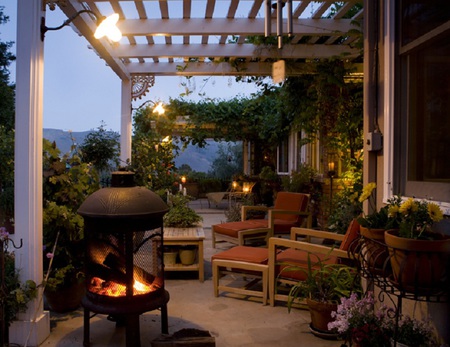 Perfect evening - house, chairs, mountain, flowers, patio, fireplace, fire, flames, plants, nice