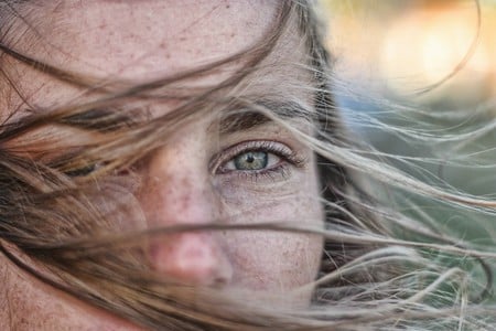 a look - nice, girl, soft, eye, clear, rose, playing, wind, beautiful, green, look, soul