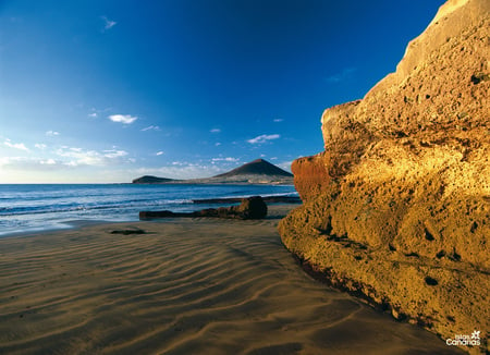 Playa del Medano, Tenerife - shore, water, beach, sand, rocks, sky