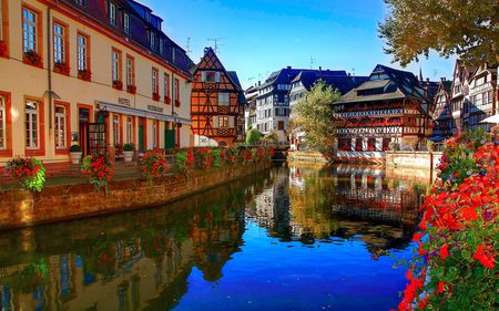 Strasbourg,France - pretty, spring, flowers, canal, hotel, house, city, beauty, colors, architecture, vases, river, wonderful, nature, italy, building, blue, town, reflection, leaves, red, view, venice, france, houses, sky, clouds, vase, trees, strasbourg, water, beautiful, buildings, lovely, colorful, peaceful, bridge, restaurant