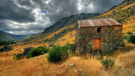 Stoneage House - house, stoneage, grass, mountain, sky