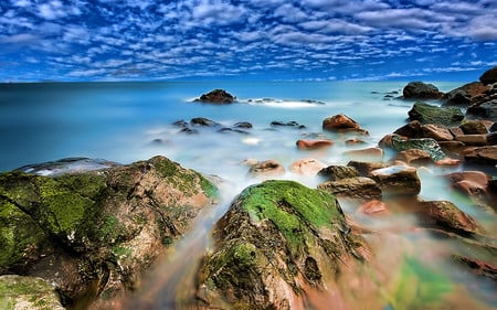 Wondering - clouds, blue, beach, sea, beauty, rocks, sky