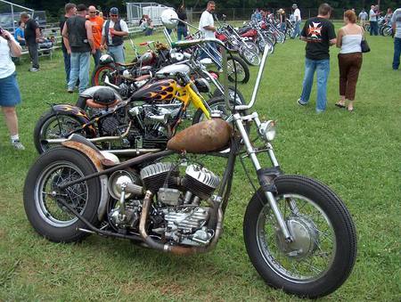 It may be rusted, but it is classified - field, people, other, motorcycles