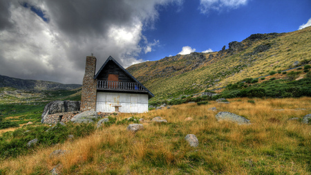 Lovely Place - mountains, beautiful, stones, grass, sky, architecture, houses, clouds, fields, nature