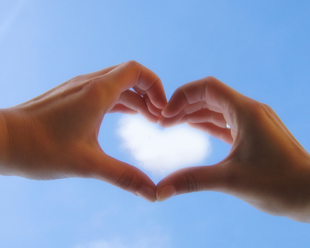 A better world - love, hands, two, sky, couple, heart, together, beautiful, clouds, blue