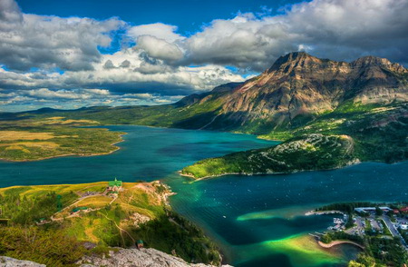 Alberta view - clouds, blue water, rock, cliffs, plants, lake, mountains, sky