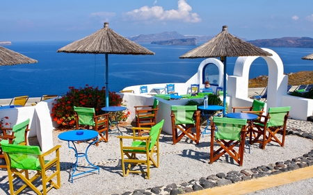 Santorini,Greece - beauty, sky, paradise, terrace, peaceful, bar, colorful, chairs, santorini, umbrellas, view, modern, pretty, clouds, table, architecture, resort, relax, summer, greece, lovely, nature, chair, town, beautiful, colors, flowers, sea