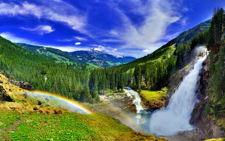 Magic Lives Here - forest, beautiful, amazing, grass, magic, view, river, nature, mountains, water, landscape, beauty, waterfall, peaceful, blue, sky, sunny, rainbow, clouds, lovely, splendor, woods, trees, colors, green