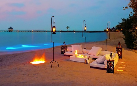 Beautiful - boardwalk, ocean, beach, flames, candles, pillows, water, fire, pier, morrocan, lanterns, romantic, wineglasses, romance, sand, dinner