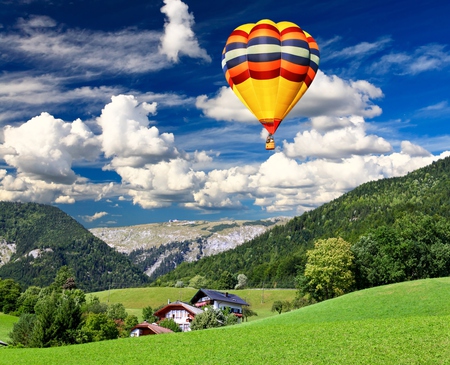 Landscape - beauty, sky, trees, peaceful, colorful, mountains, balloon, balloons, view, pretty, hot air balloons, clouds, green, house, grass, houses, hills, landscape, lovely, nature, blue, beautiful, splendor, colors, hot air balloon