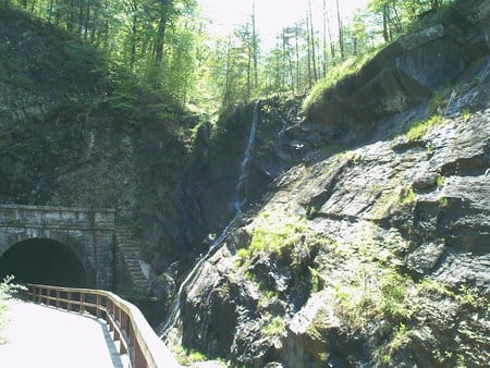 The Other Side - tunnel, waterfall, walkway, rocks